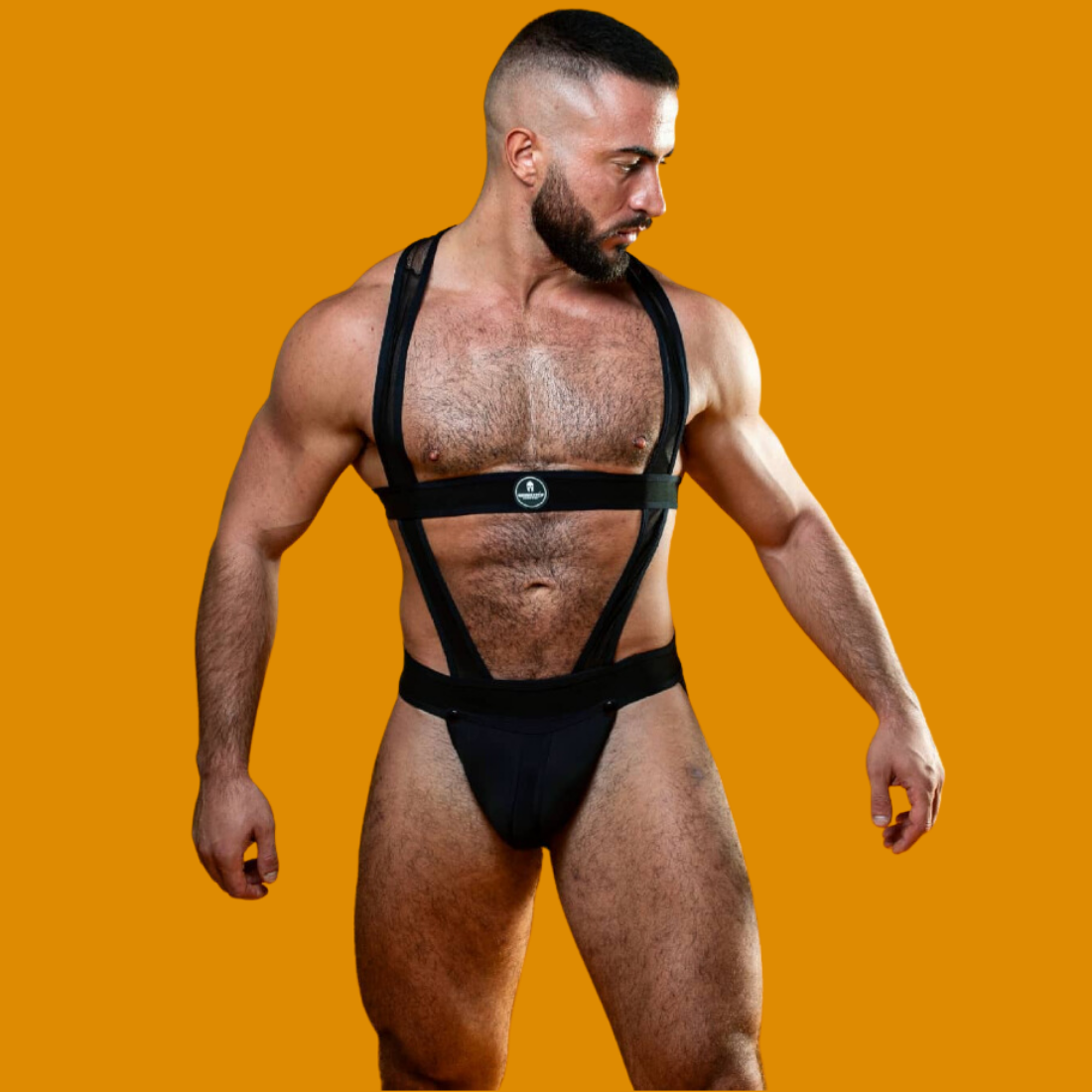 Zwarte gay singlet ontworpen door het Italiaanse modehuis Sparta’s Harness, te koop bij Flavourez.