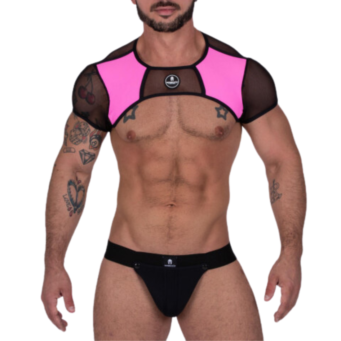 Sexy roze harnas en zwarte jockstrap ontworpen door 'The House Of Sparta's Harness' en t koop bij Flavourez.