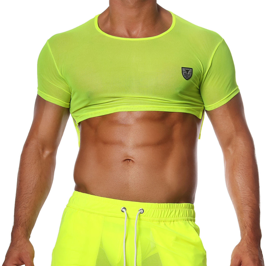 Sexy neon gele gay crop top, ontworpen door het Franse modehuis Tof Paris en te koop bij Flavourez.