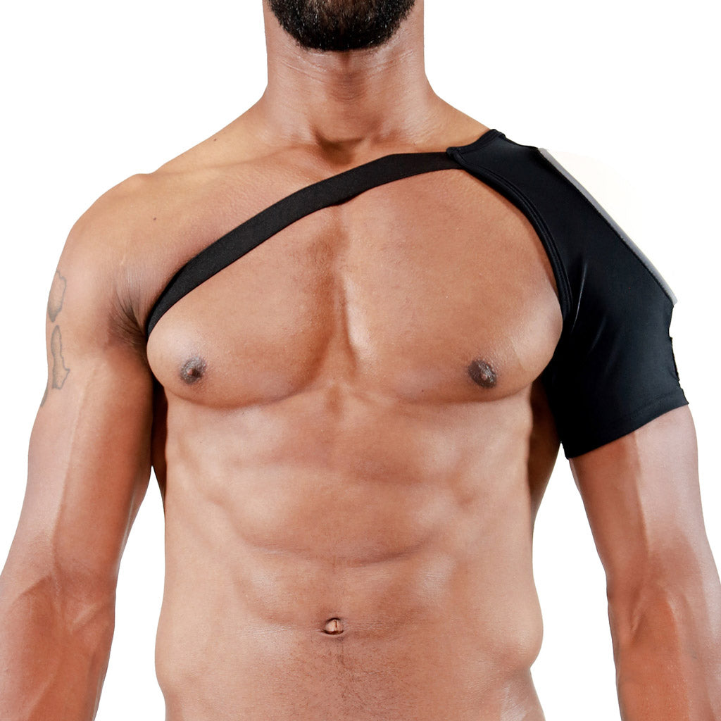 Sexy zwart schouderharnas met witte schouder pad, ontworpen door TOF Paris. Producten van TOF Paris zijn te koop bij Flavourez