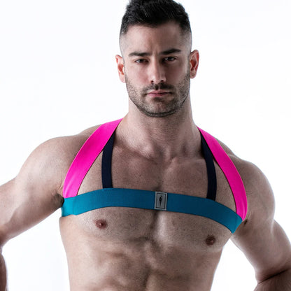 Neonblauw met neonroze harnas. Ontworpen door Leader. Perfecte outfit voor een gay club of cruise bar. Verkrijgbaar bij Flavourez