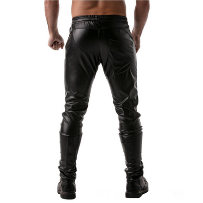 Zwarte fetish sportbroek van glanzend imitatieleer, ontworpen door Tof Paris en te koop bij Flavourez.